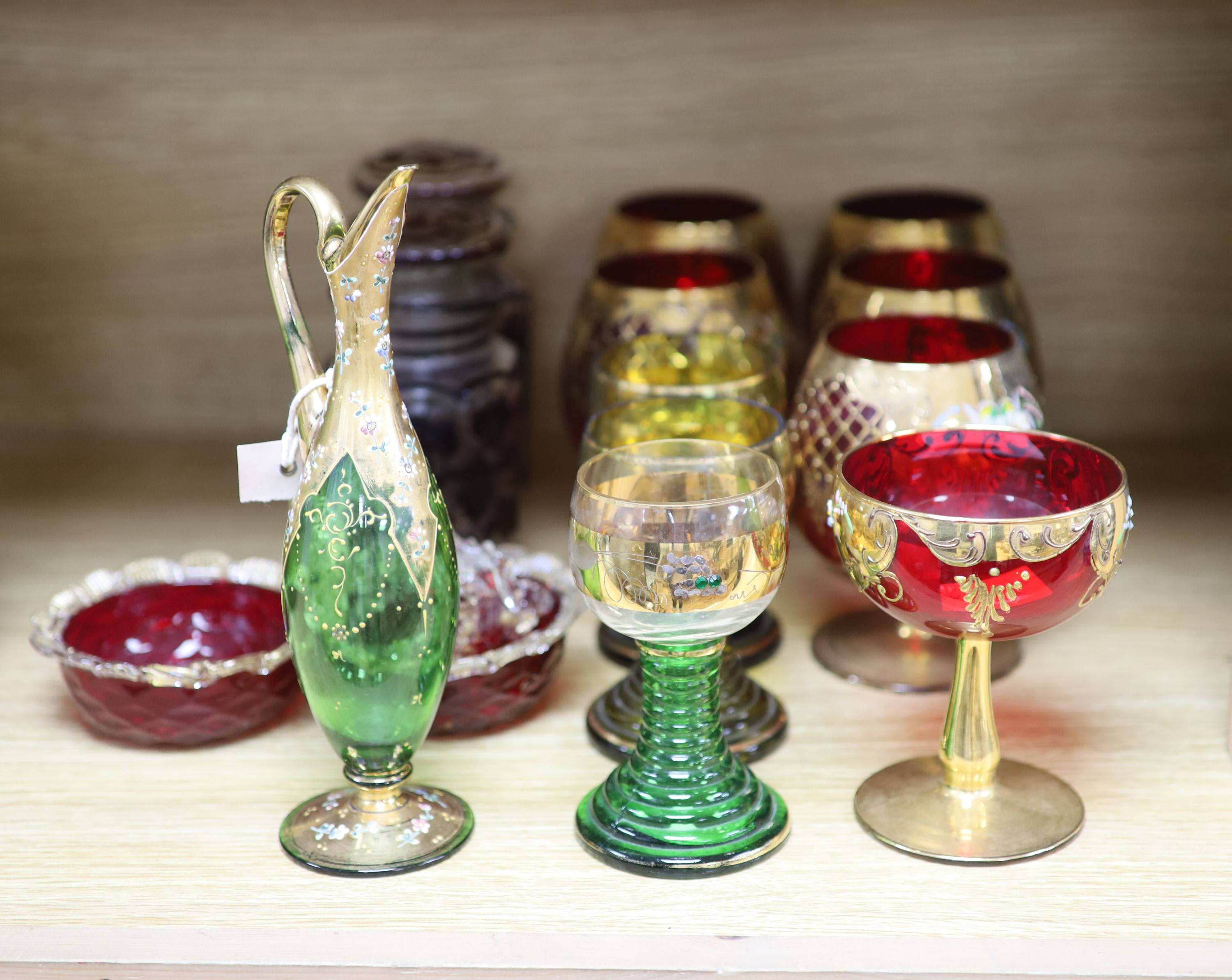 A collection of gilt decorated glasses and a jug, etc